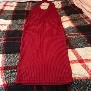 Never worn, BURGUNDY color, halter top style, maxi dress.